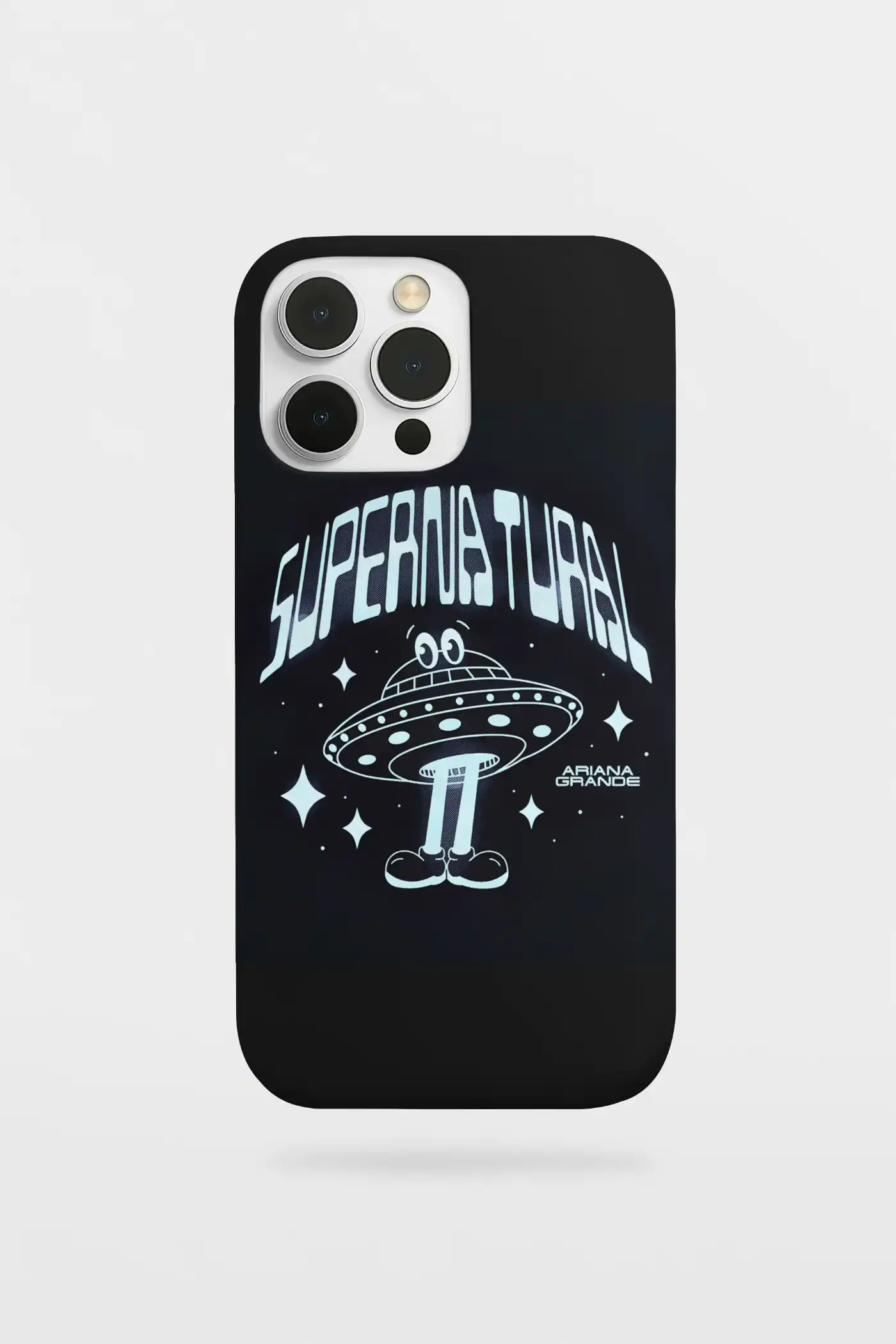 Ariana Grande merch phone case with a space-themed UFO design and "Supernatural" text.