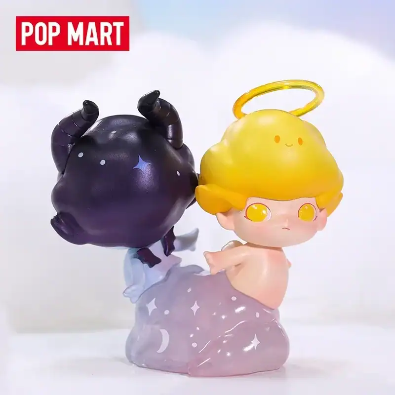 Pop mart ariana grande merch collectible figure with angelic character and celestial theme.