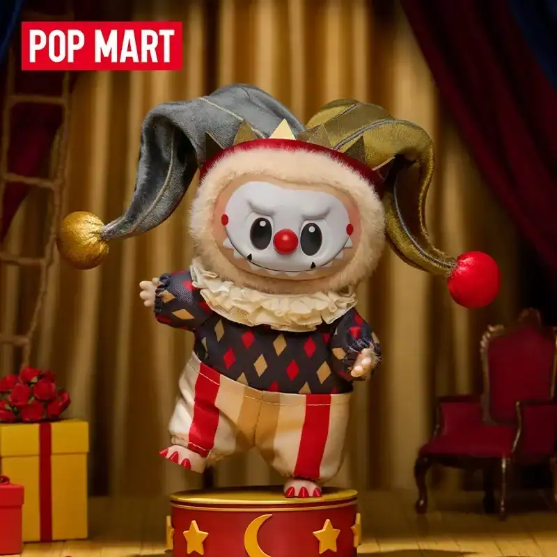 Pop mart creepy clown doll figure with a jester hat, plush costume, and spooky face in a circus-themed setting.