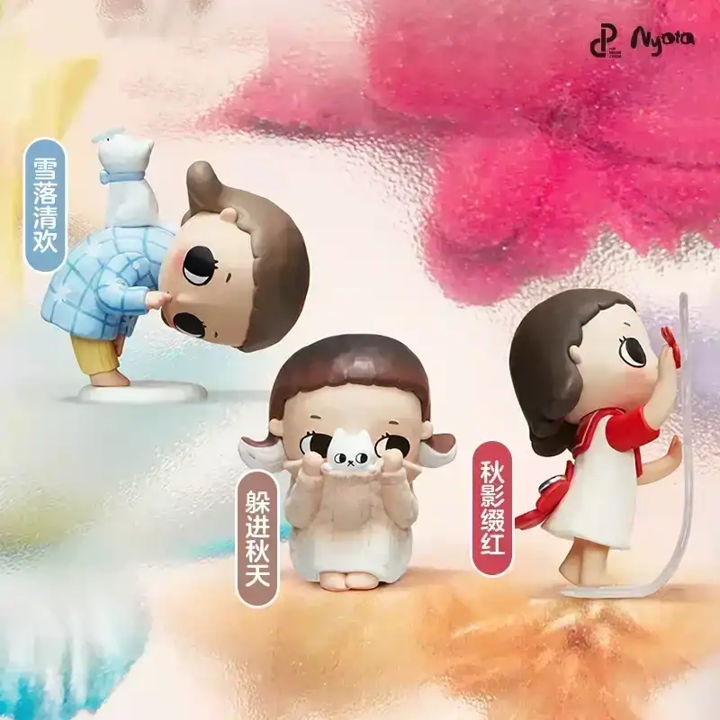 Colorful ariana grande merch figurines with cute animal accessories.