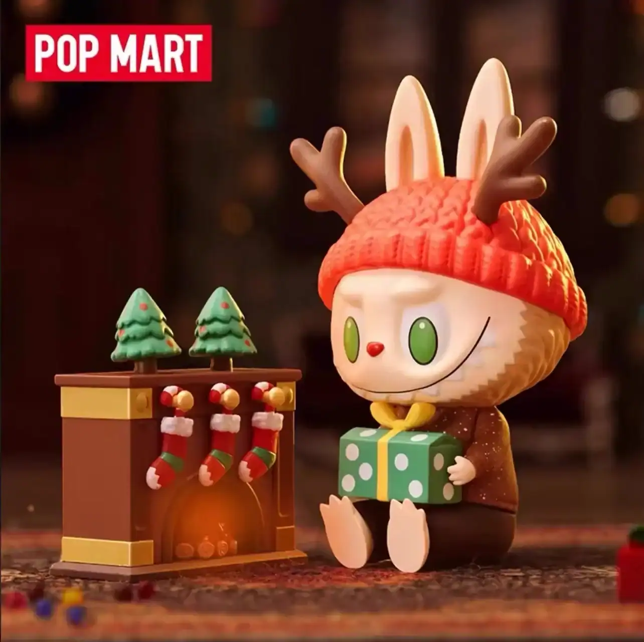 Pop mart reindeer figure with Christmas hat and gift box.