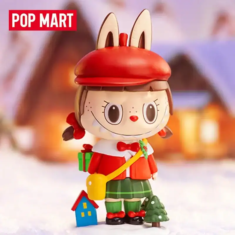 Cute cartoon-style character toy with large eyes, red hat, and Christmas accessories, perfect for holiday gift shopping.