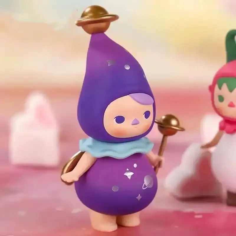 Fantasy character figurine with galaxy-themed outfit and orbiting planet accessories.