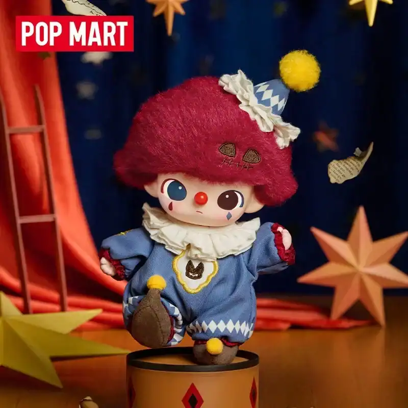 Pop mart ariana grande merch plush doll with colorful costume and whimsical design dressed as a clown character with a red wig and blue outfit.