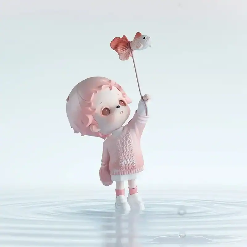 Cute collectible doll with pink hair holding a fish-shaped balloon, dressed in pink and white pastel outfit, in a minimalistic white background.