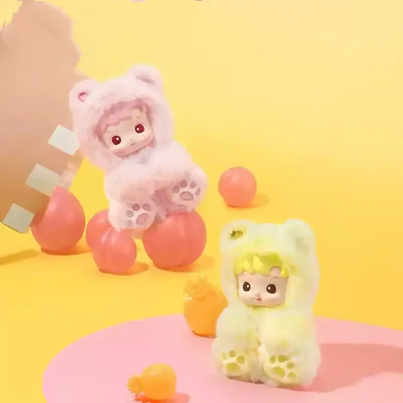 Pink bear plush toy with big eyes and paws on a yellow background.